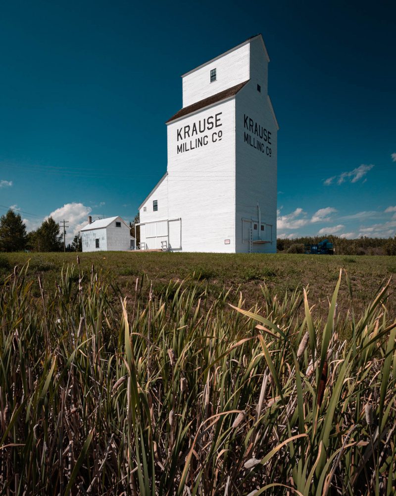 Grain Elevator / Mill in Central Alberta, Blue sky and a white building